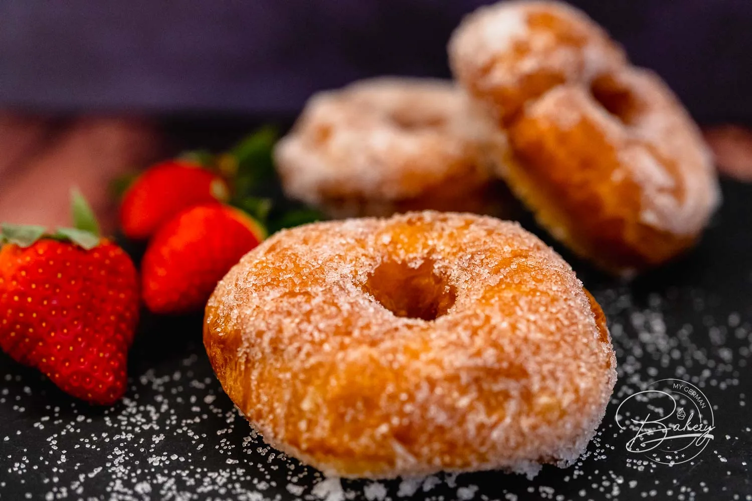 Donuts recipe - delicious, fluffy, easy and quick homemade - Make your own donuts - simple donuts recipe and Berlin variant with yeast dough baked in a pan. Delicious donuts cake rings with sugar, powdered sugar, chocolate.