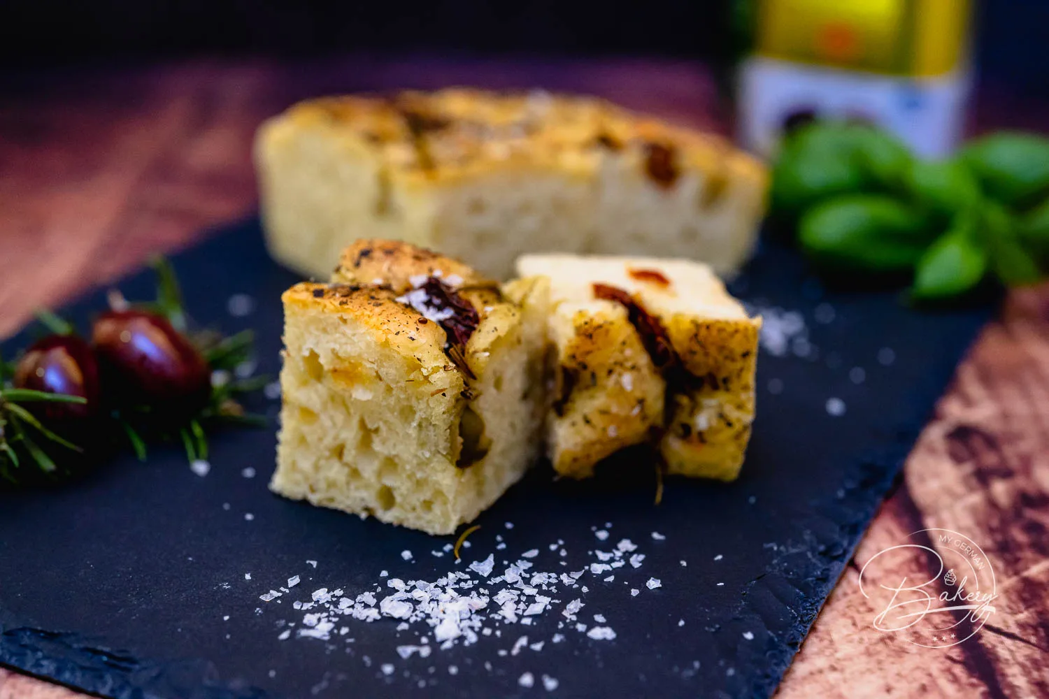 Focaccia recipe - delicious, simple bread with olives and tomatoes - Italian Bread Focaccia Schiacciata Recipe - Dinner Bread for Italian Evening Baking Recipe - Simple Focaccia recipe for airy, fluffy, delicious bread made with yeast dough, olives, tomatoes, rosemary, Italian herbs.