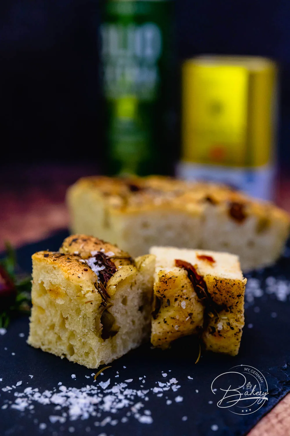 Focaccia recipe - delicious, simple bread with olives and tomatoes - Italian Bread Focaccia Schiacciata Recipe - Dinner Bread for Italian Evening Baking Recipe - Simple Focaccia recipe for airy, fluffy, delicious bread made with yeast dough, olives, tomatoes, rosemary, Italian herbs.