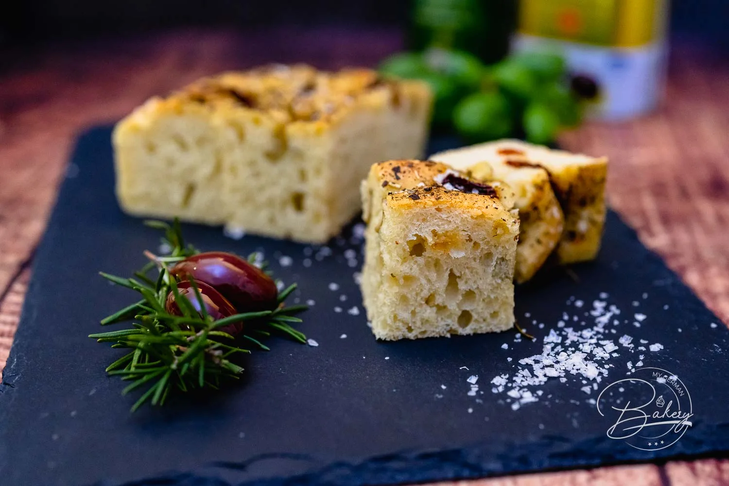 Focaccia recipe - delicious, simple bread with olives and tomatoes - Italian Bread Focaccia Schiacciata Recipe - Dinner Bread for Italian Evening Baking Recipe - Simple Focaccia recipe for airy, fluffy, delicious bread made with yeast dough, olives, tomatoes, rosemary, Italian herbs.