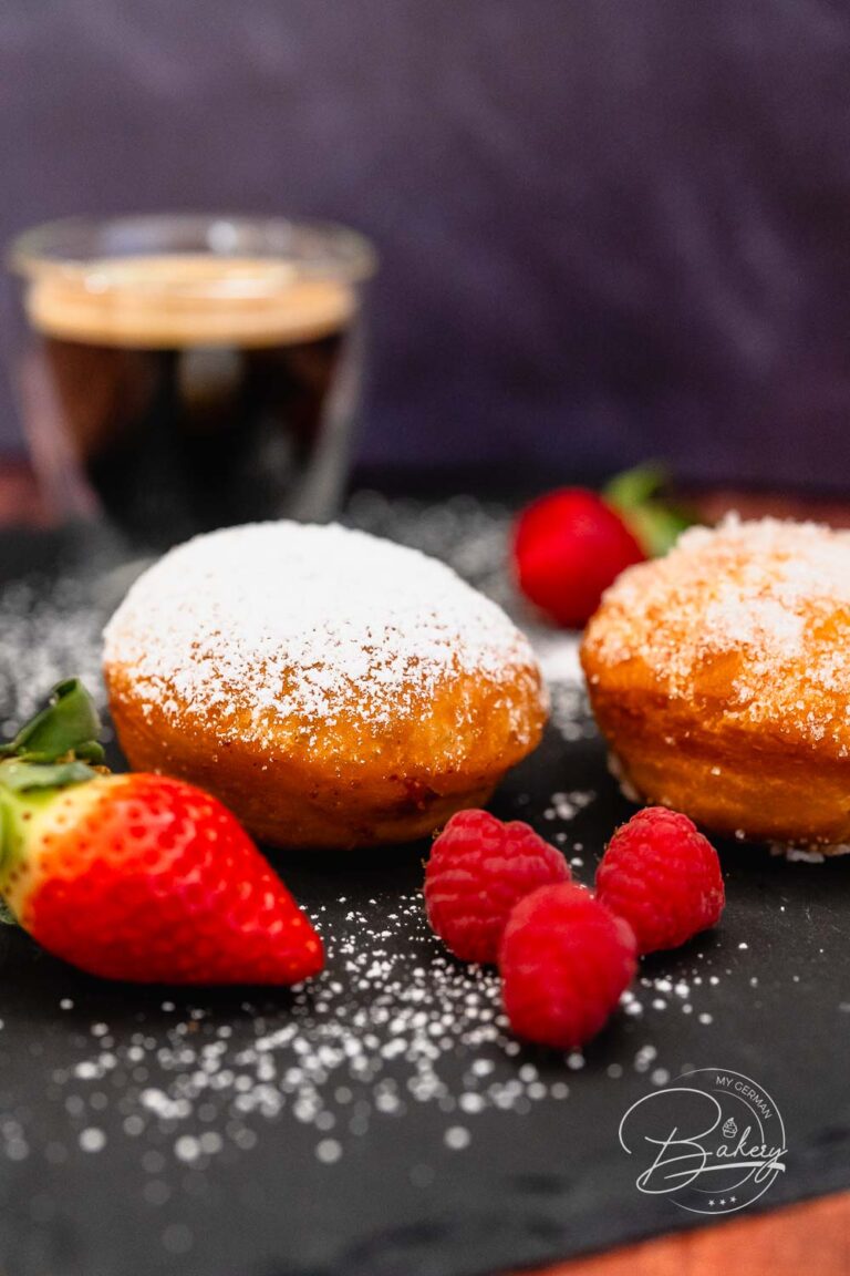 Classic jelly donuts recipe or Bismark Donuts Recipe - Homemade Jelly Doughnuts and Bismark Doughnuts - German Berliner Pfannkuchen recipe to bake in a pan. Jelly donuts with yeast and oil. Filled with jam or custard.