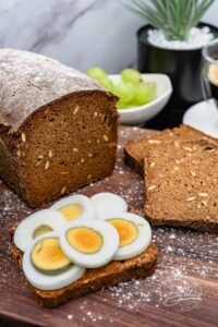 Wholemeal bread recipe with rye meal and sugar beet molasses as dark brown bread as a wholemeal bread recipe with rye meal and sugar beet kraut or sugar beet syrup. Dark bread, like pumpernickel bread